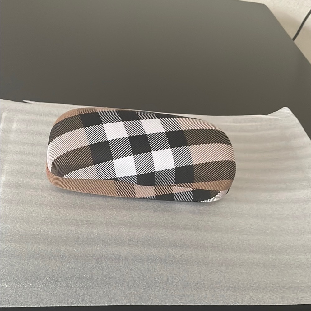 Plaid eye glass case, over sized glasses it will hold.